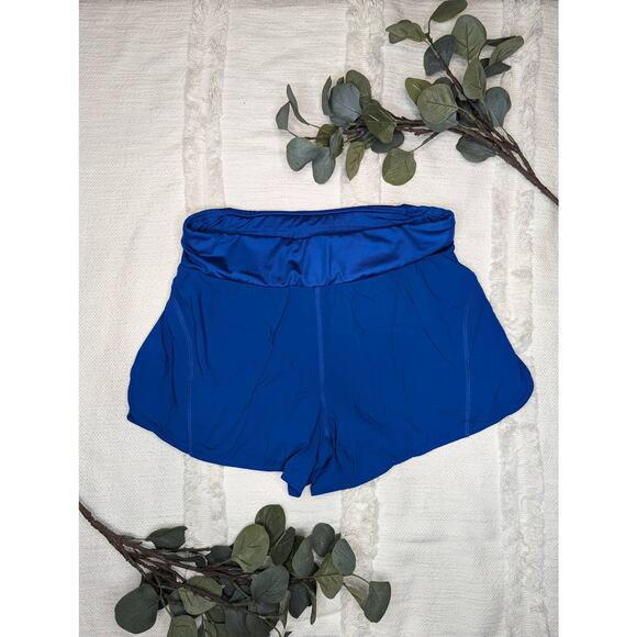 Fabletics Lined Running Shorts in Blue & Green - Picture 2 of 3